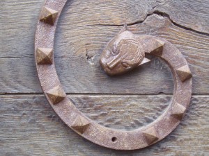 photo of detail on a door at the church in Rocamadour, France