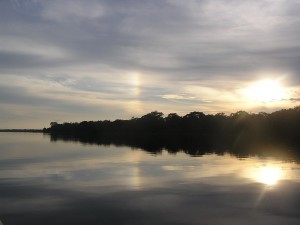 photo of sunlight on a still stream