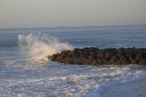 photo of surf on rocks