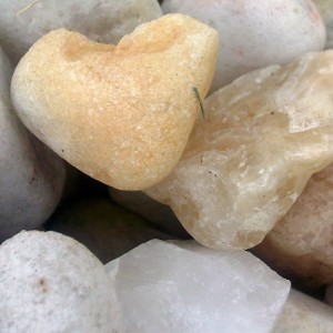 photo of stones, one that looks like a heart